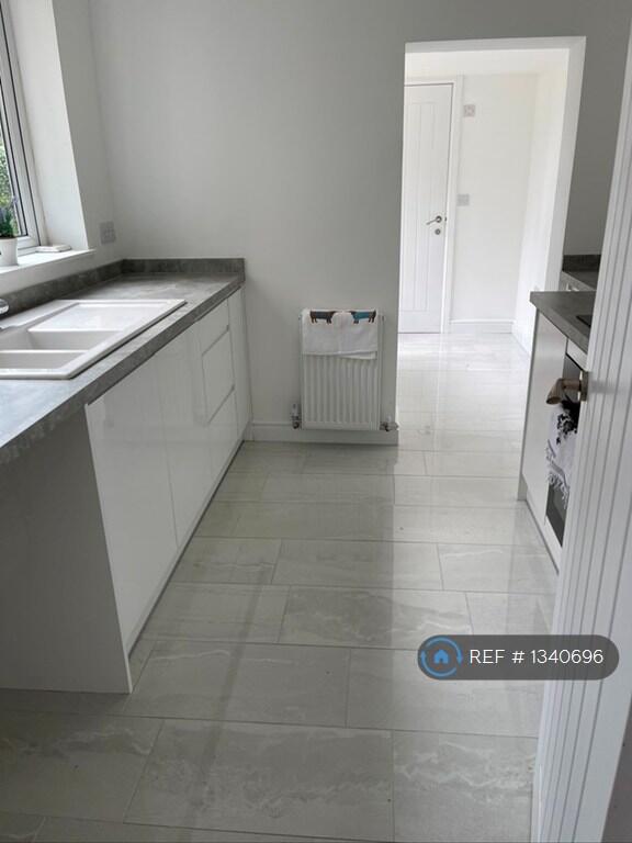 View From Kitchen To Middle Room And Cloakroom