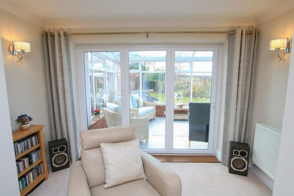 PRINCIPAL SITTING ROOM