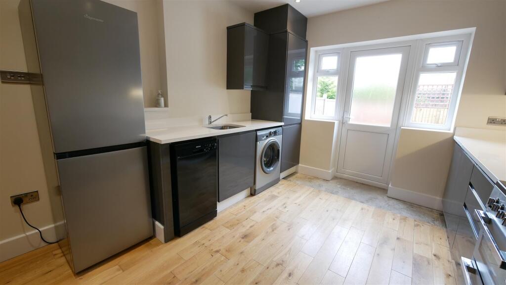 LIVING ROOM / OPEN PLAN KITCHEN
