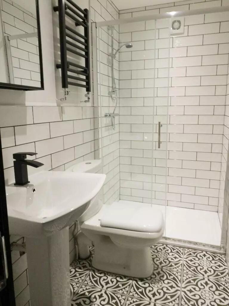 A fresh and modern bathroom featuring stylish p...