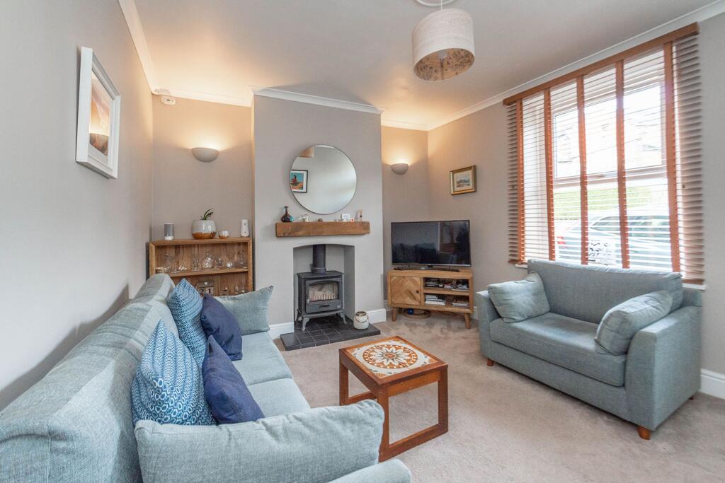 SITTING ROOM AND DINING KITCHEN