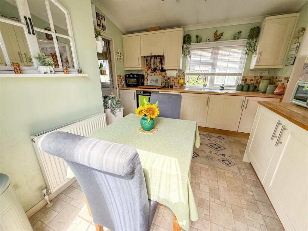 ALTERNATE VIEW OF KITCHEN