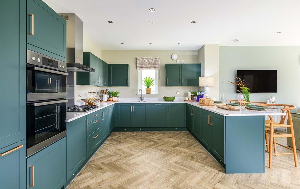 The spacious kitchen overlooking the garden room