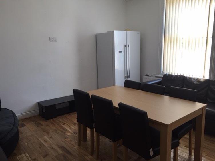 The room features a cozy and functional space w...