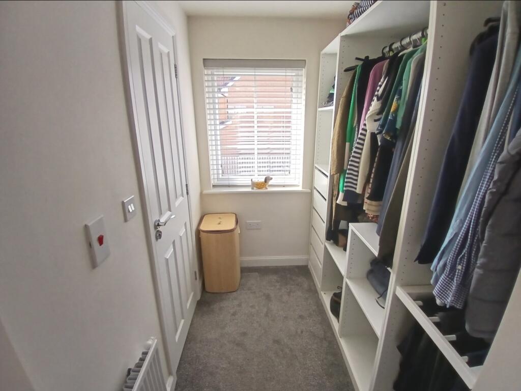 BEDROOM ONE DRESSING AREA