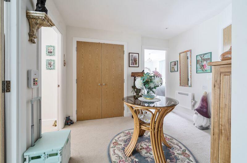 Entrance hall with storage cupboard