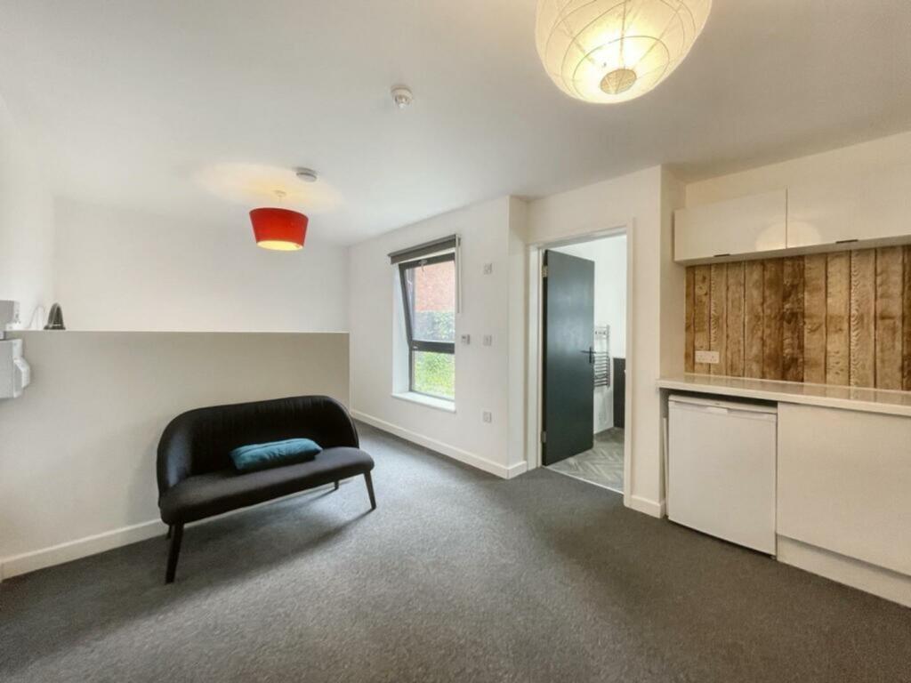 A bright and inviting living room, perfect for ...