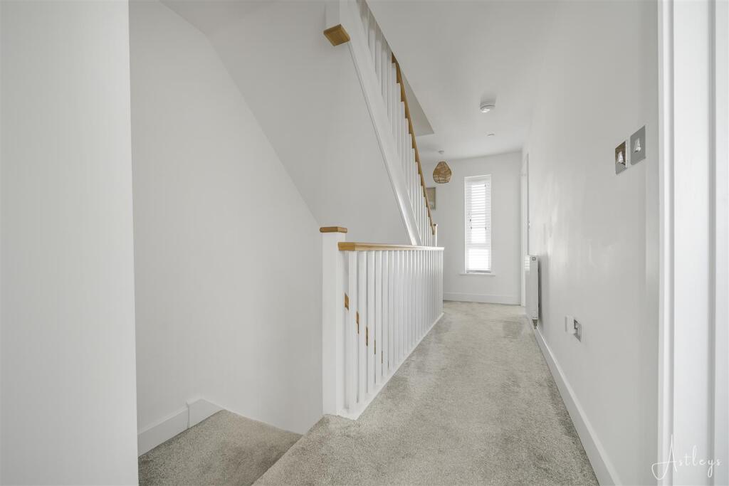 Landing to first floor