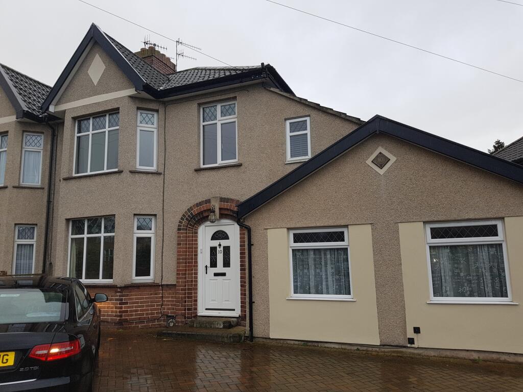 A welcoming exterior of a property featuring a ...