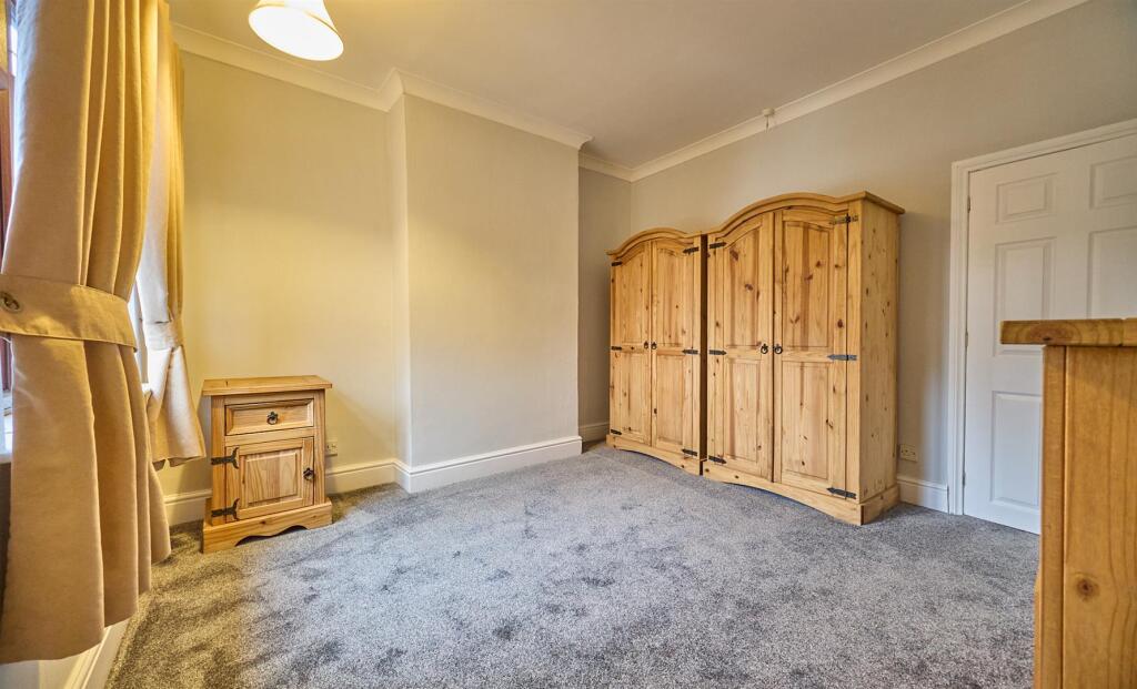 BEDROOM TWO TO REAR