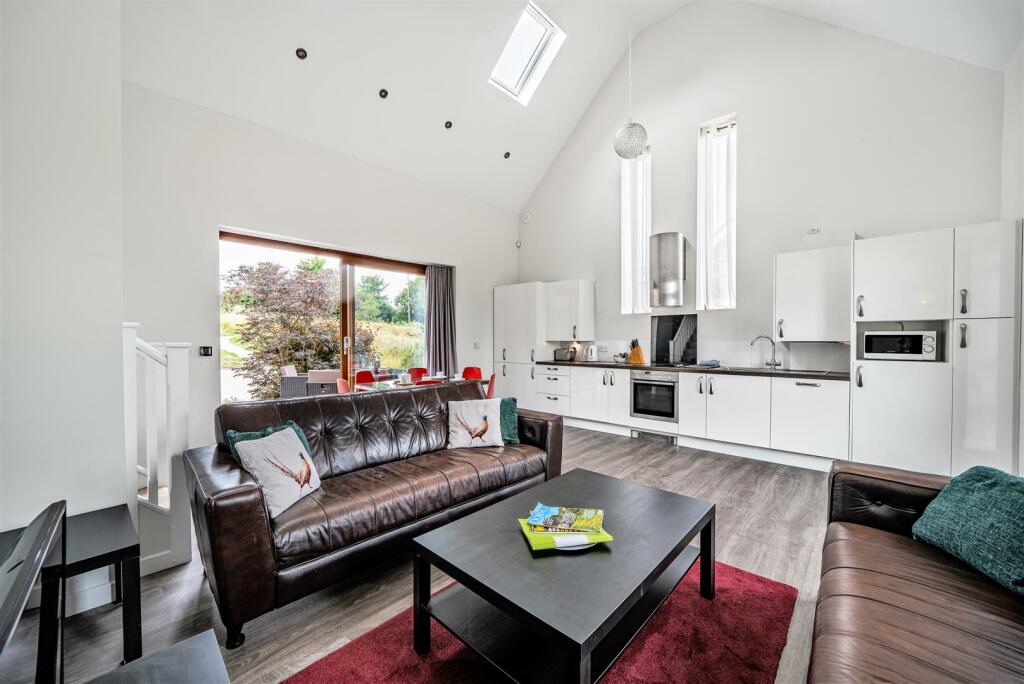Open plan sitting/kitchen/dining area