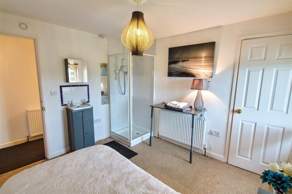 Bedroom 3 with shower and sink