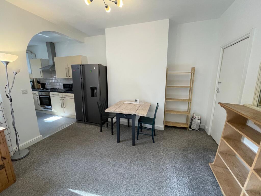 SITTING ROOM DINING ROOM AND KITCHEN