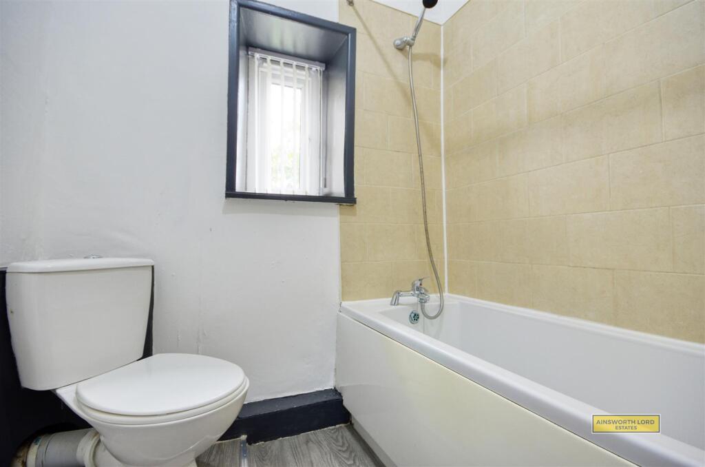 Bathroom with Shower Over