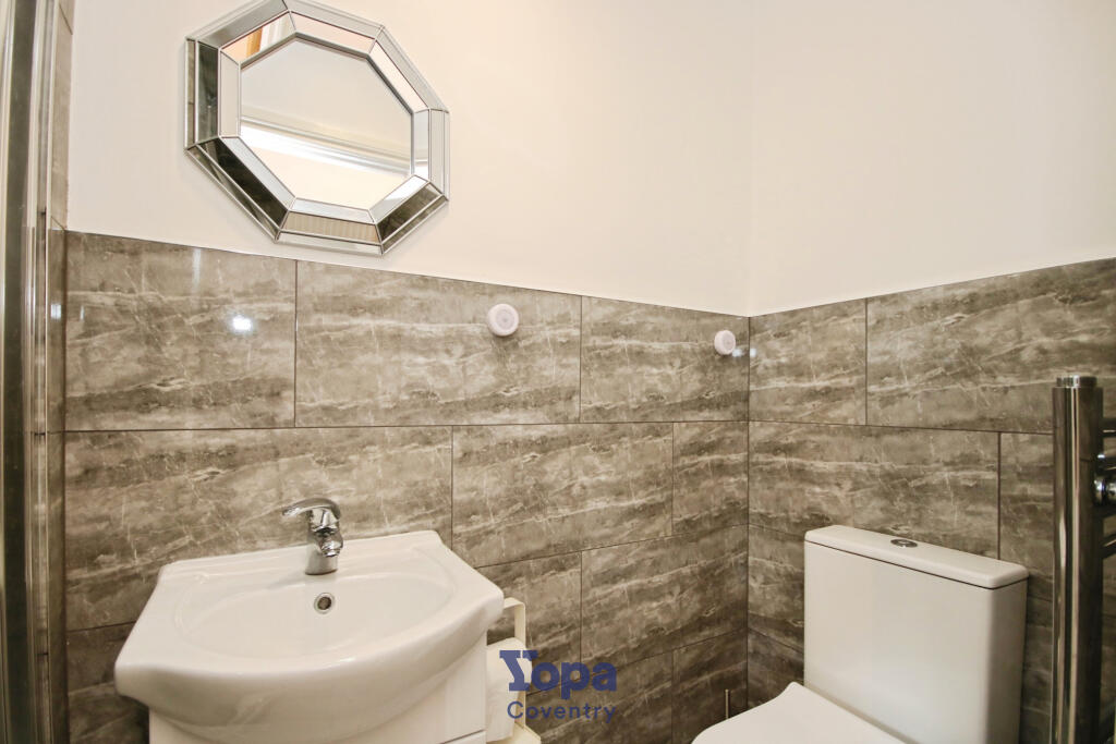 B06839de-Shower 202.JPG