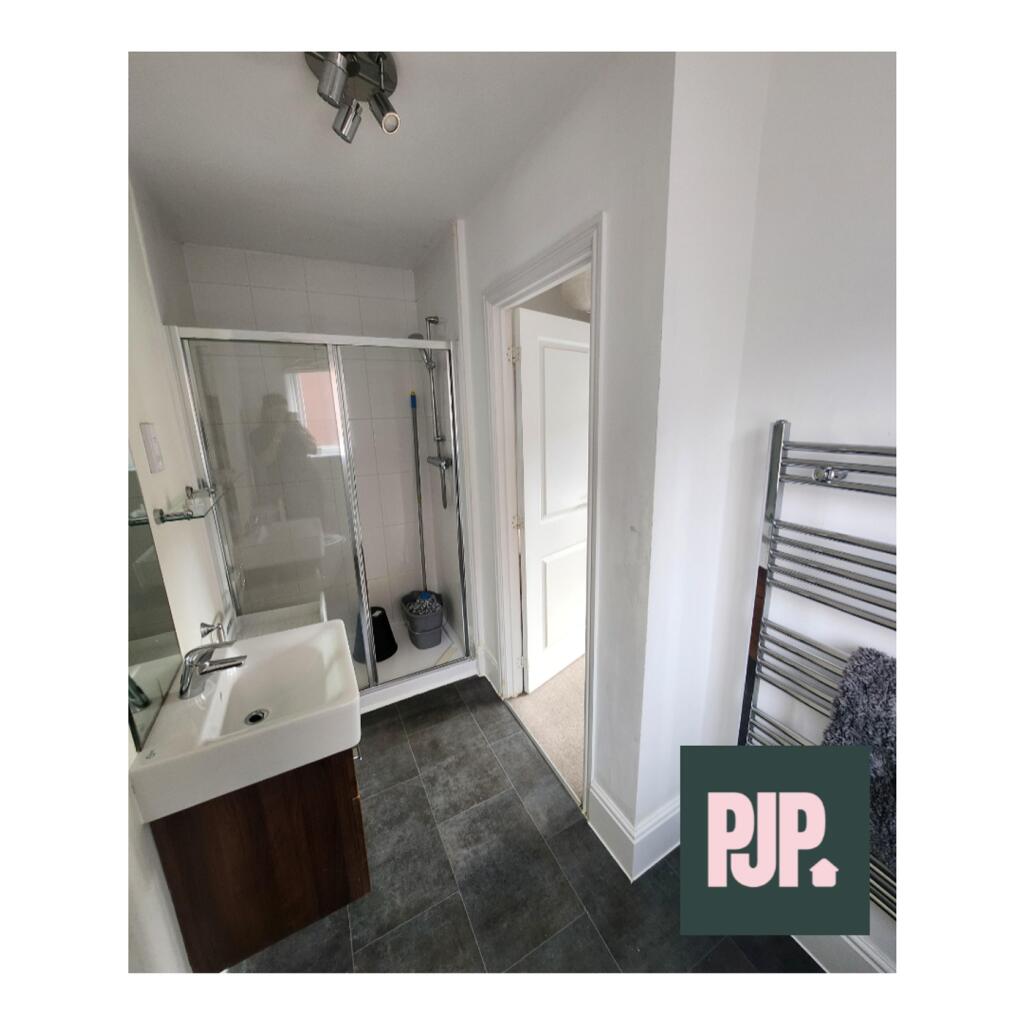 A modern and well-maintained bathroom featuring...