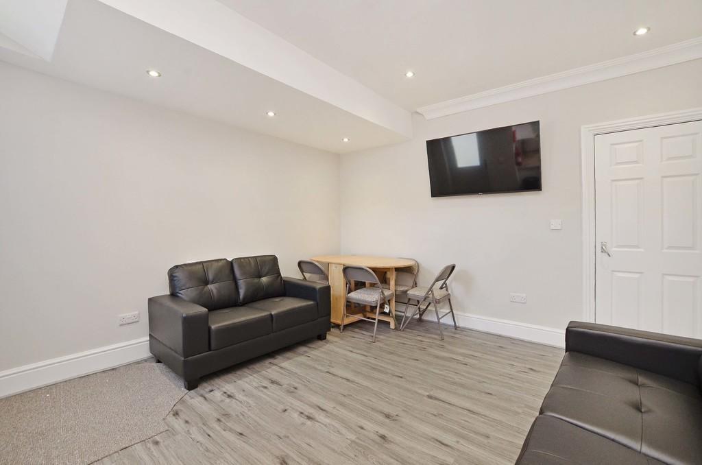Contemporary living room featuring comfortable ...