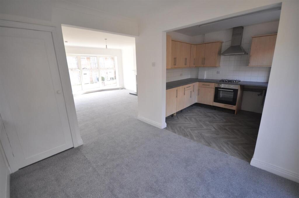 Dining room into kitchen.JPG