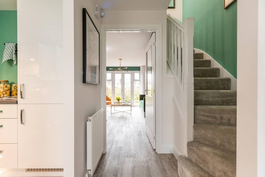 The Canford has a bright hallway with a convenient downstairs toilet