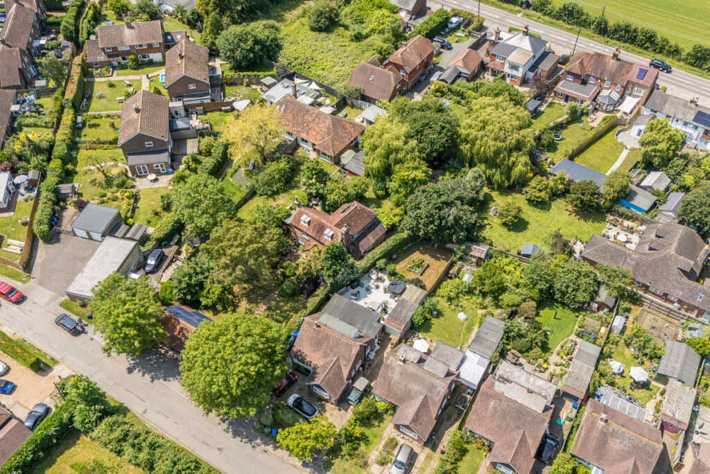 Aerial view of the house and plot
