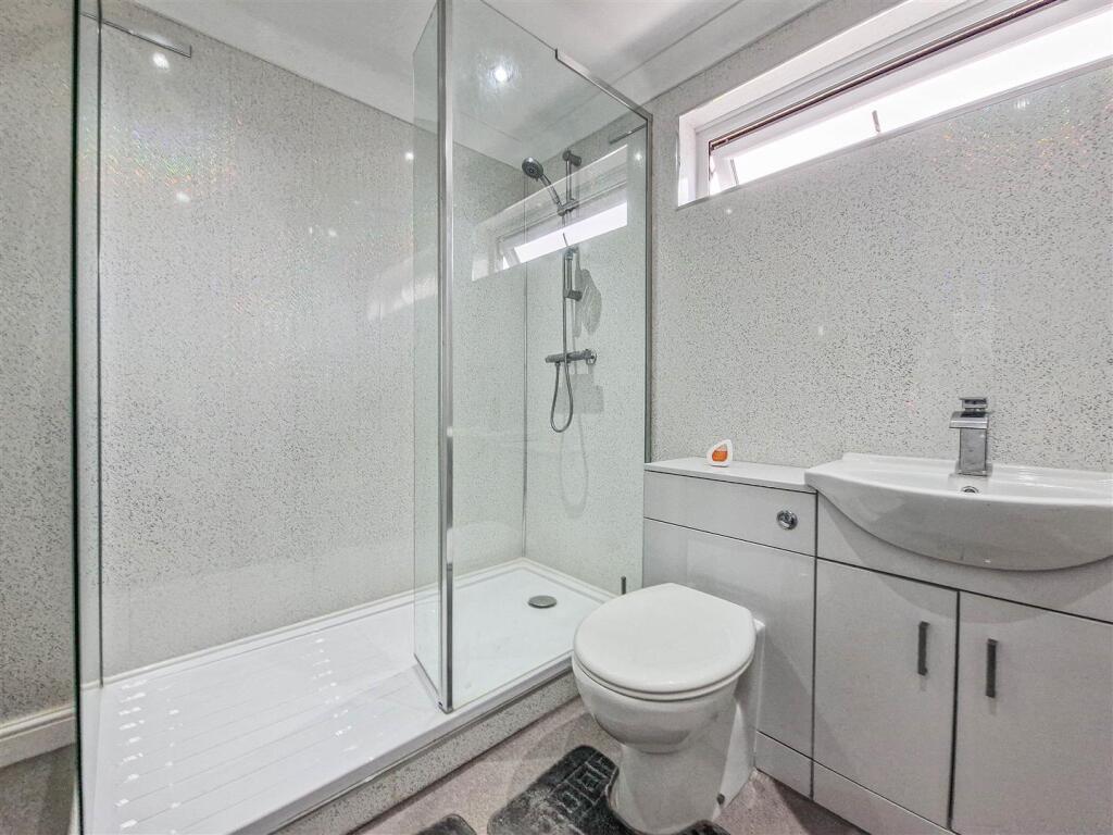 Shower room (with utility cupboard)