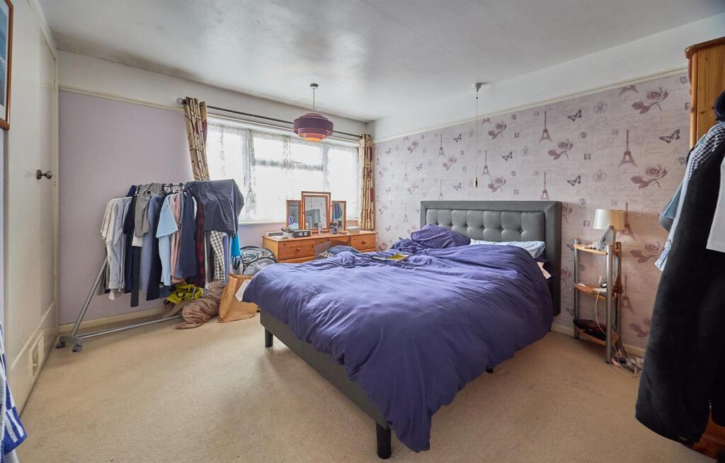 BEDROOM ONE TO FRONT