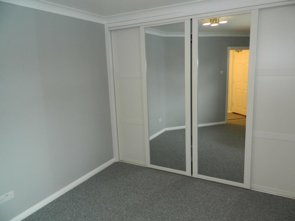 fitted wardrobes in bed 