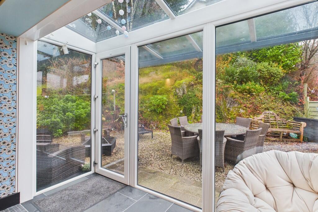 Porch and rear en...