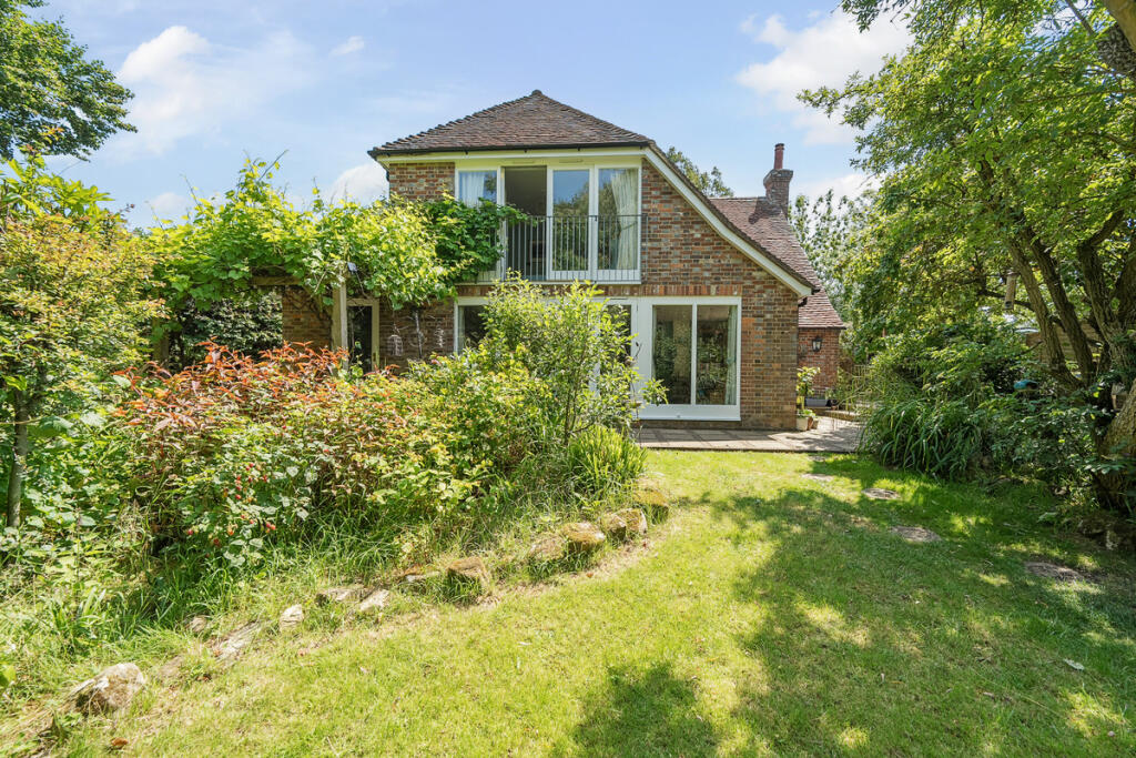 Private and secluded West facing rear garden and rear elevation