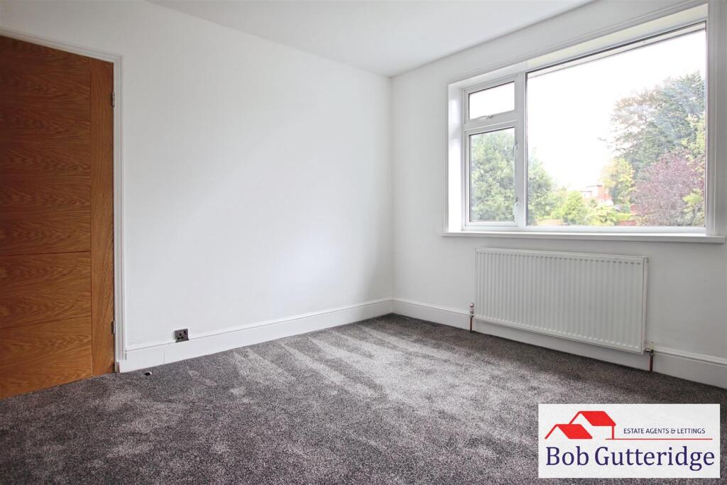 BEDROOM ONE (REAR)