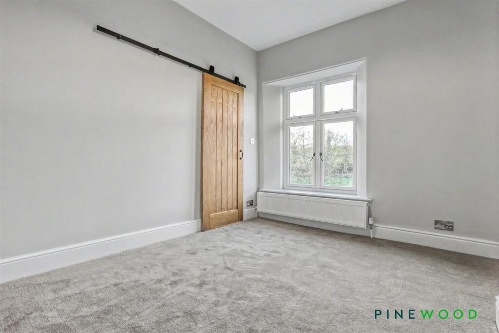 BEDROOM ONE (FRONT)