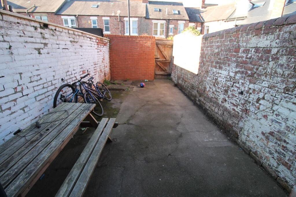 A charming outdoor garden space perfect for rel...