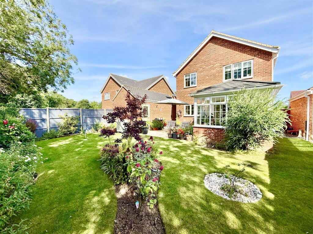 rear aspect and garden