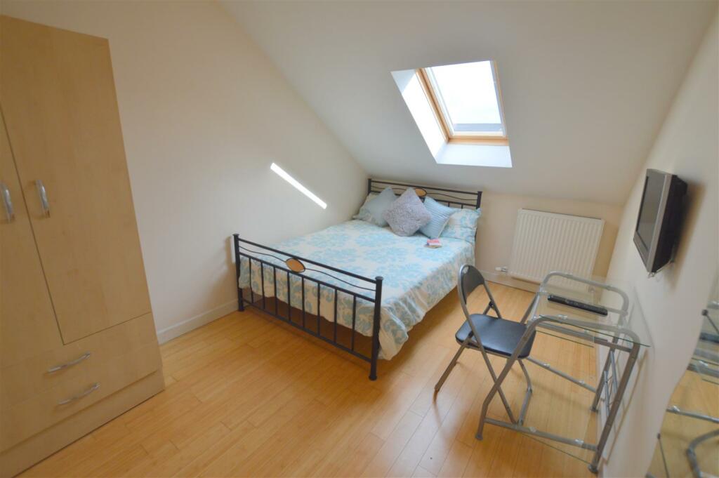 165 Cartington Terrace Orange Bedroom.jpg