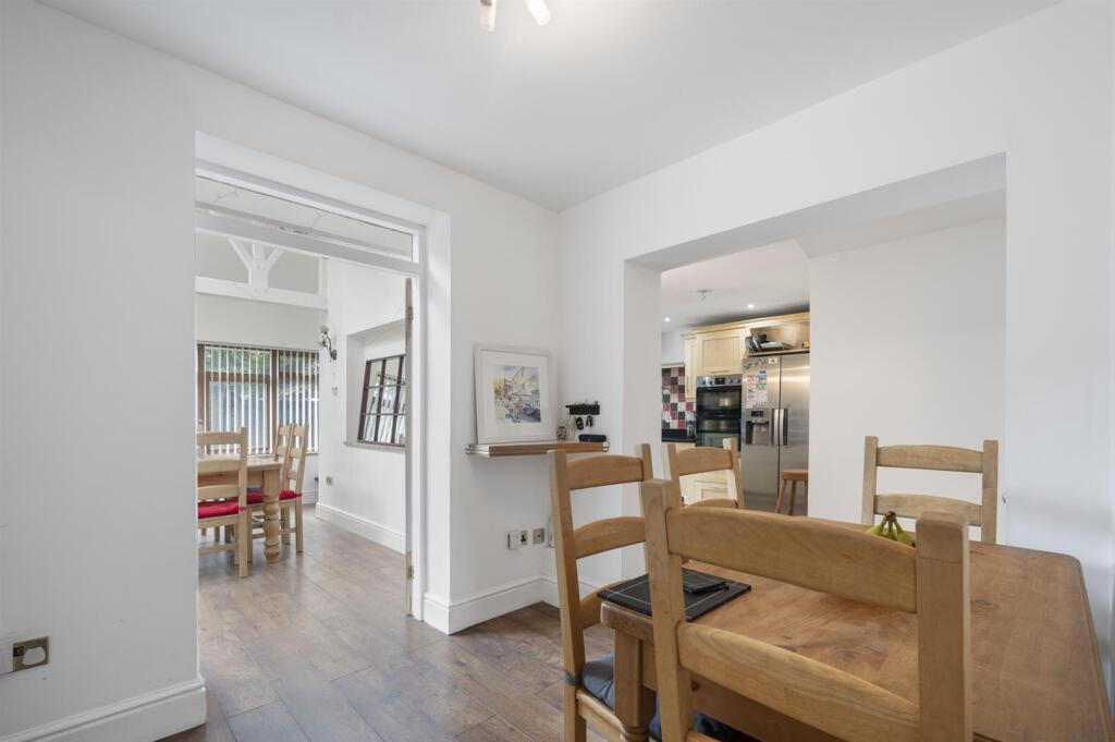 Dining Area to kitchen and garden room.jpg
