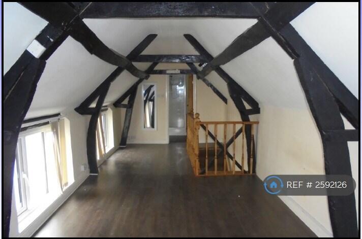 Upstairs Looking Towards The Bathroom