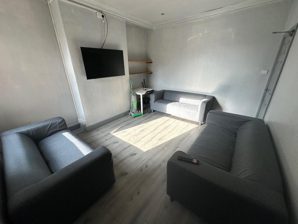 A cozy living room featuring two comfortable so...