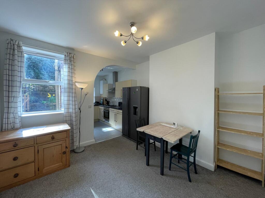 SITTING ROOM DINING ROOM AND KITCHEN