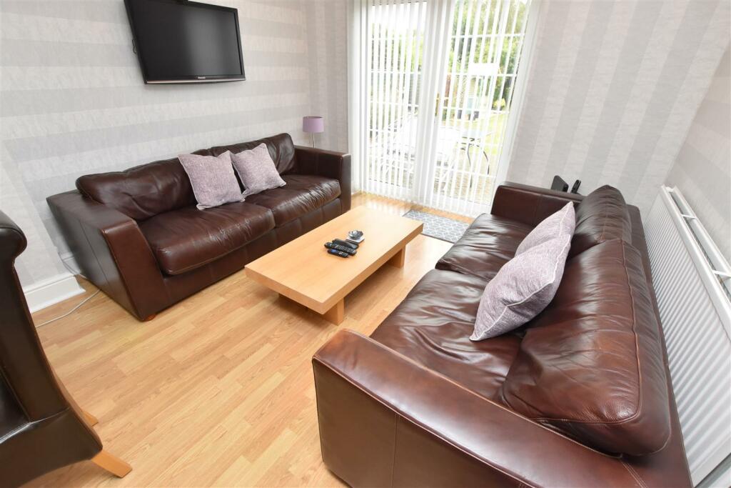 DINING ROOM/REAR SITTING ROOM