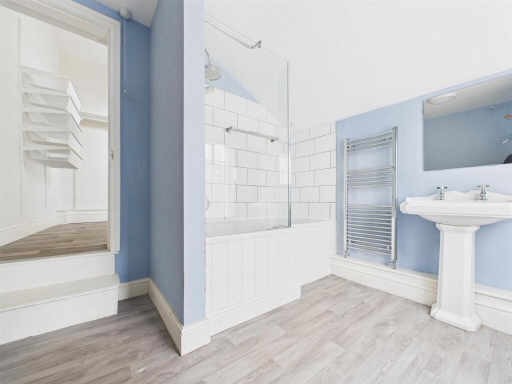 Family Bathroom With Access To Utility