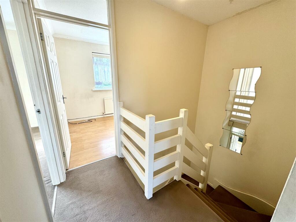 FIRST FLOOR - STAIRS AND LANDING