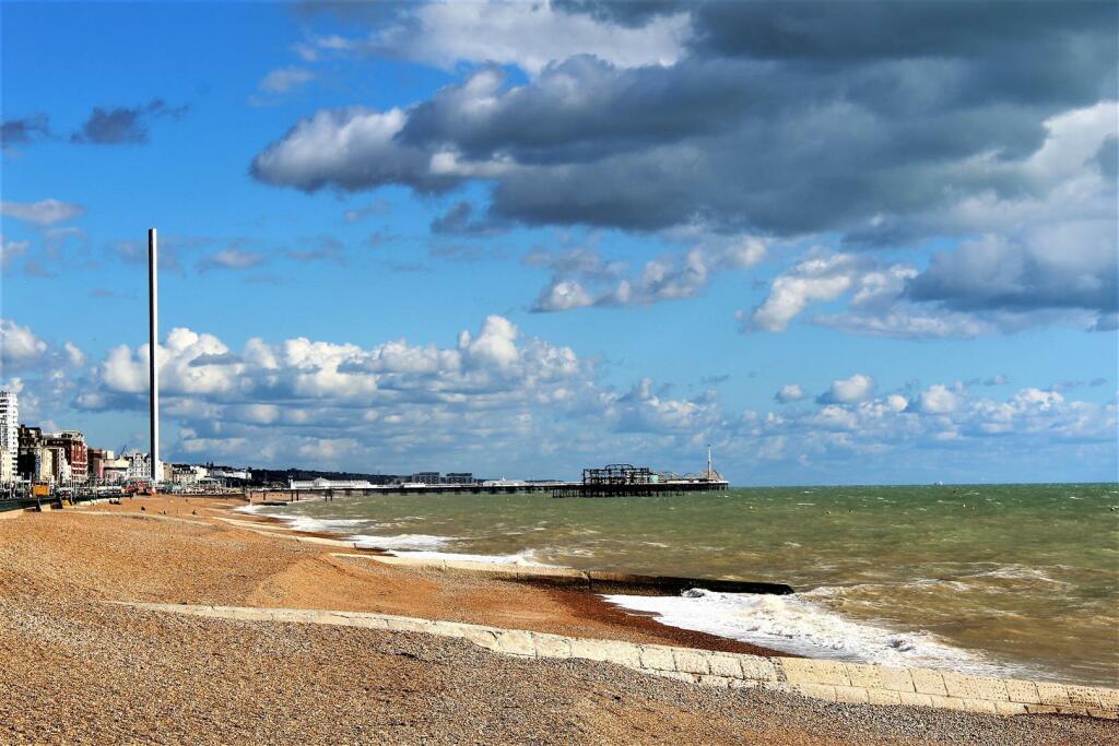 West Pier blue sky clouds.JPG