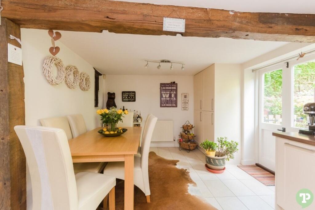 Kitchen/dining room with door in to garden