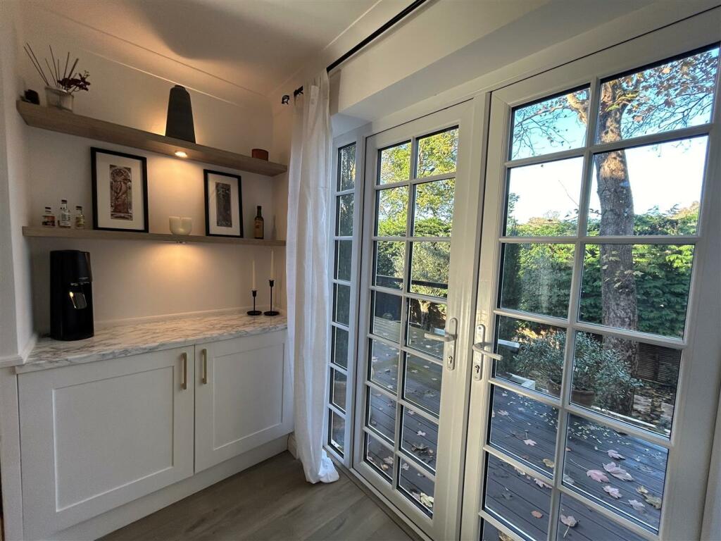 1 Devonshire Drive dining room bar.jpg