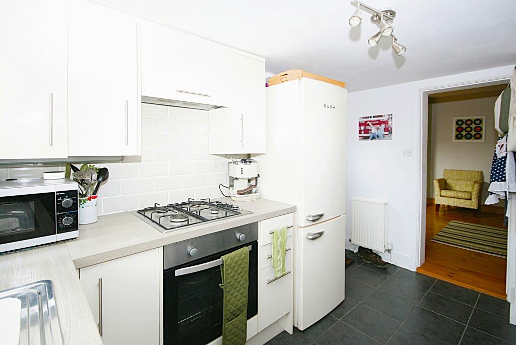 10 KitchenLookingBack toBackRoom.JPG