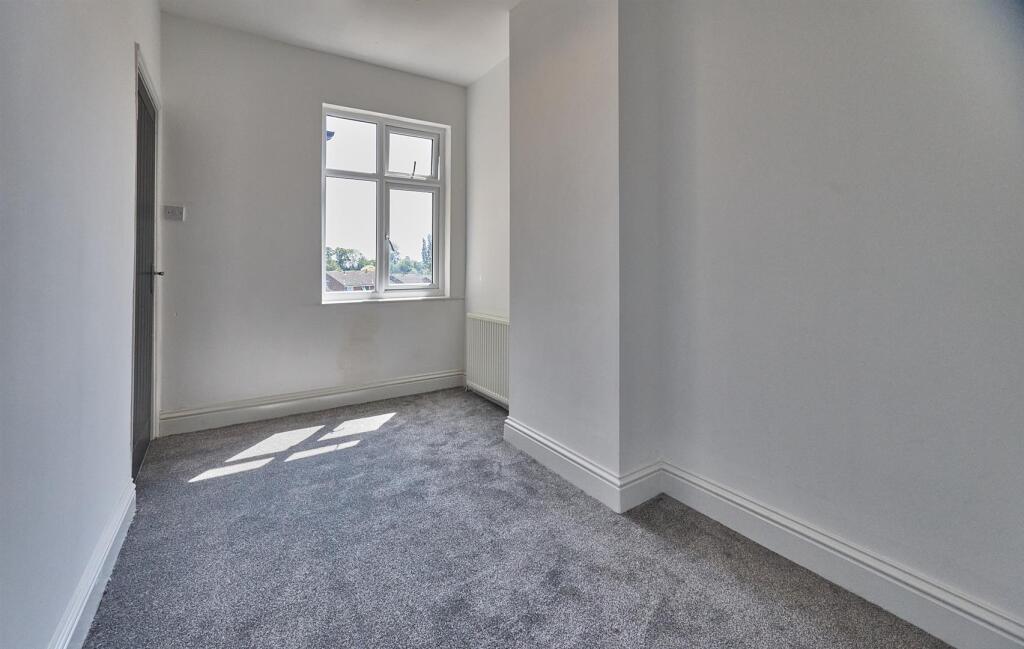 BEDROOM TWO TO REAR
