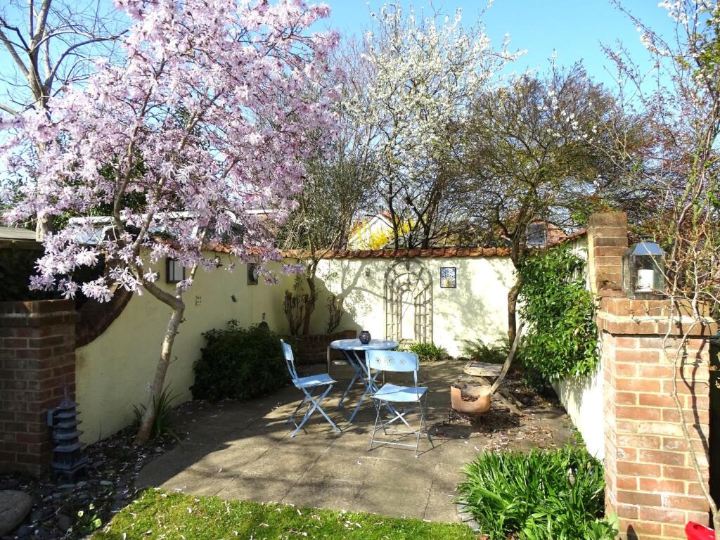 MEDITERRANEAN STYLE PATIO TO LOWER GARDEN AREA