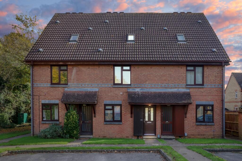 Front view of the property at dusk
