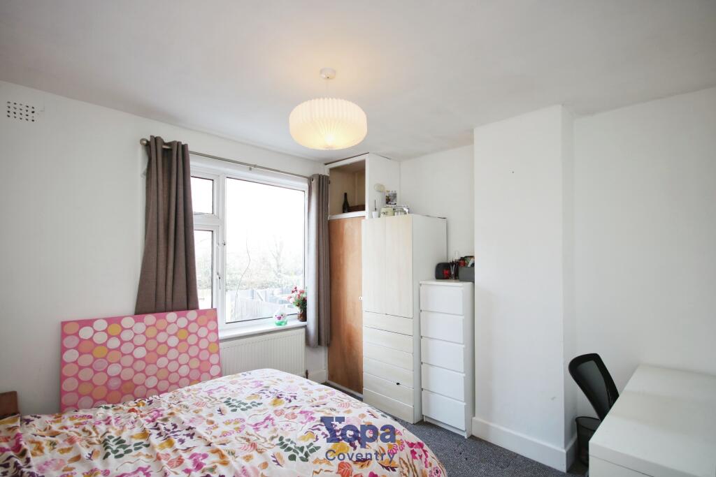 Dd6b1dc2-Bedroom 202.JPG