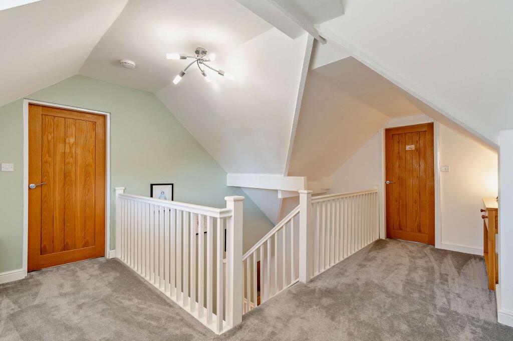 Hallway rising to the landing
